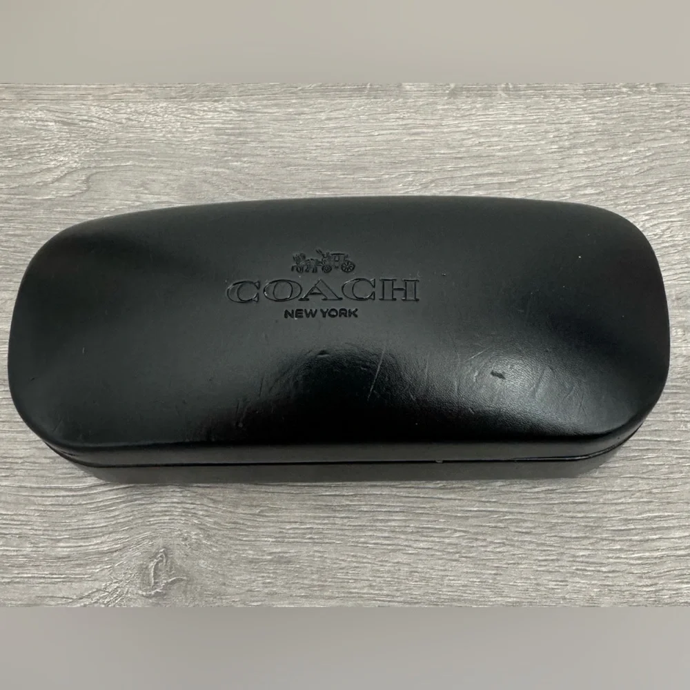 COACH New York Glasses case Black. Used. Has some small dents. See photo.